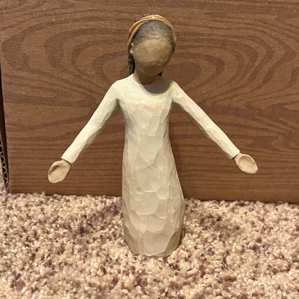 Elegant Cream Figurine with Gold Details